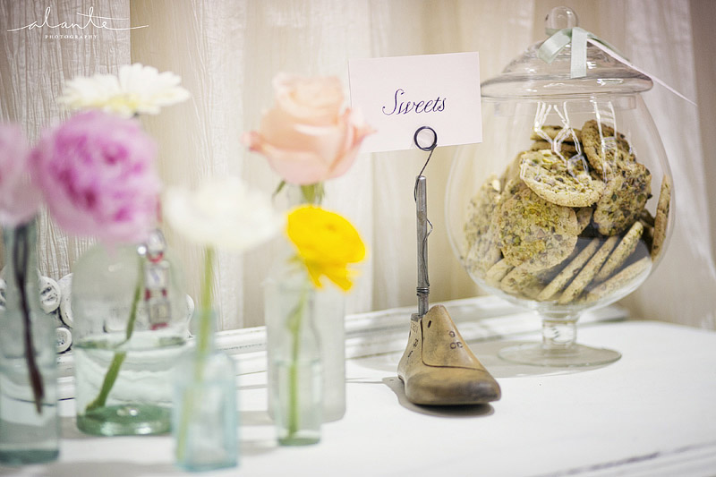 Single stem wedding flowers with vintage shoe forms